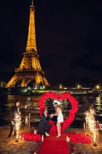 Couple holding hands with violinist