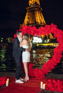 Couple on red carpet with Eiffel Tower