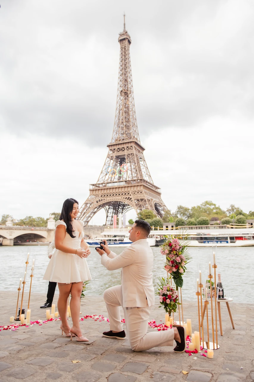 Couple in white with camera