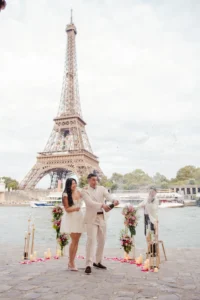 Couple in white with bottle