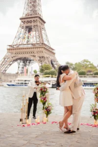 Man playing violin on path with couple