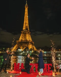 Couple with musical instrument Eiffel Tower