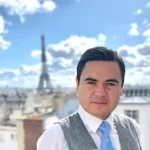 Oscar Rivera coordinating marriage proposal at Eiffel Tower Paris