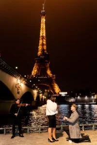 Man with violin woman and person with object