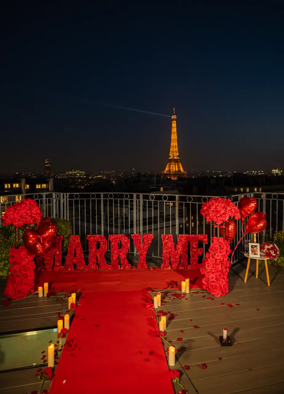 Red carpet candles flowers Eiffel Tower