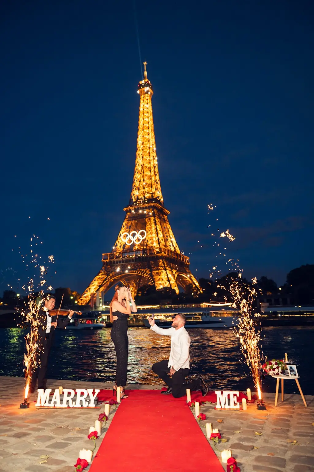 Couple on red carpet with bow microphone